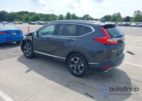 2019 Honda Cr-V Touring z USA, uszkodzony, nr VIN 7FARW1H97KE014050